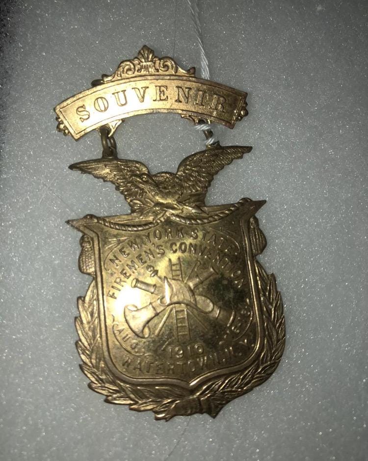 1910 New York State Fireman’s Convention Watertown NY Souvenir Pin